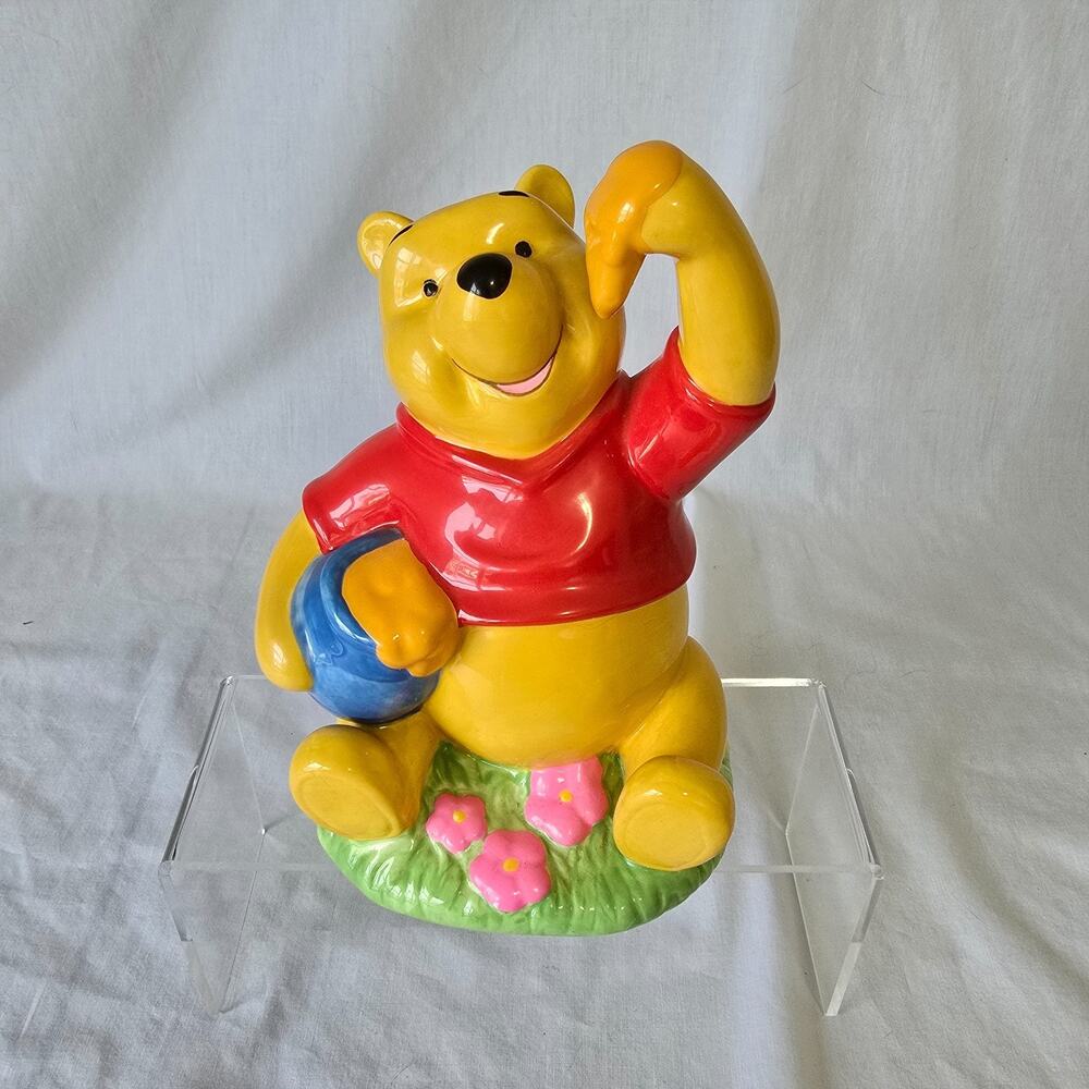 Disney Winnie the Pooh Ceramic Coin Bank Pooh Sitting Eating Honey Figurine
